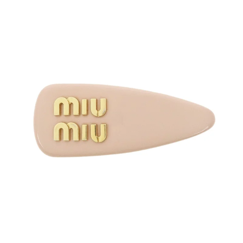 MIU MIU bags in a variety of texturesMIU MIU Patent Leather Hair Clip Pink Beige