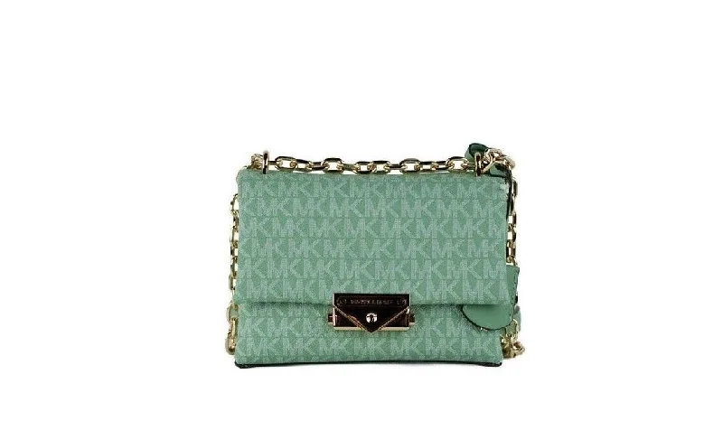 Michael Michael Kors Bags for opera nights in a glamorous and refined styleMichael Kors Cece Small Sea Green Signature PVC Convertible Flap Crossbody Bag