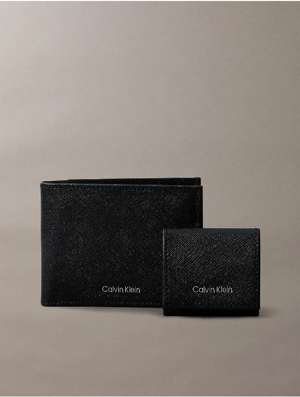 Calvin Klein mini bags for partiesMen's Refined Saffiano Leather Bifold Wallet + Airpods Case Gift Set - Black