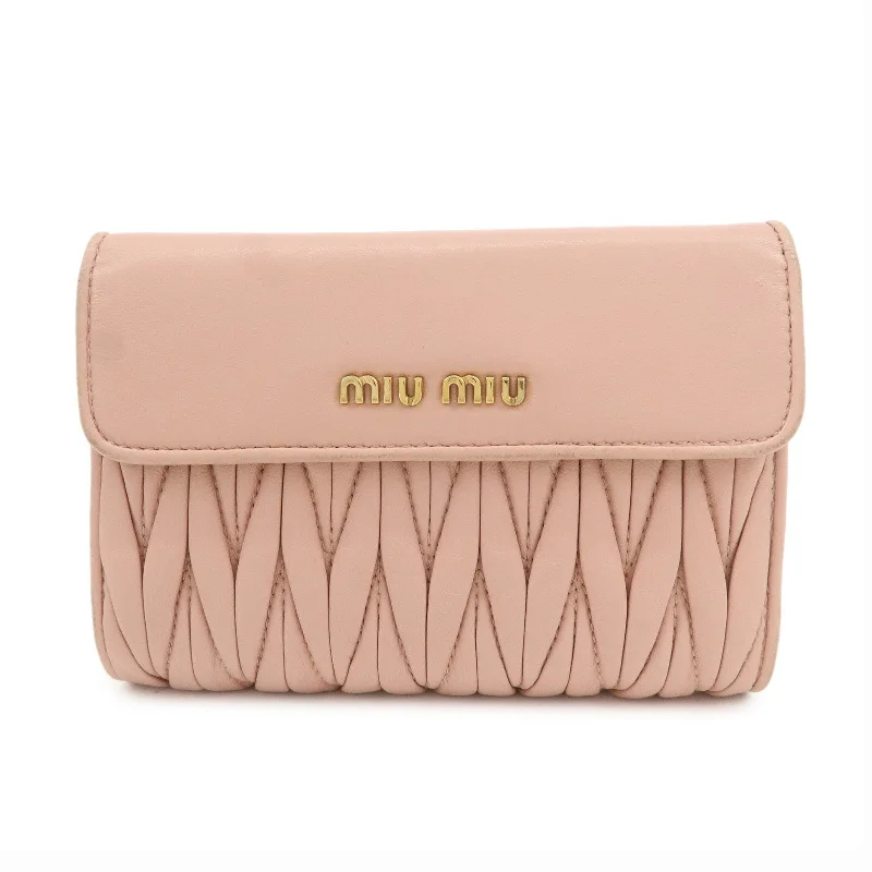 MIU MIU bags in classic black leatherMIU MIU Matelasse Leather Round Zipper Bi-fold Wallet Pink