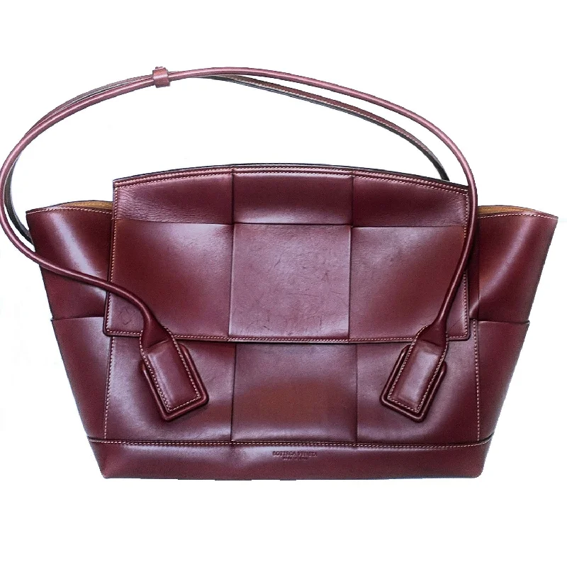 Bottega Veneta bags for garden partiesBottega Veneta Arco Large Bordeaux Intrecciato Leather Bag