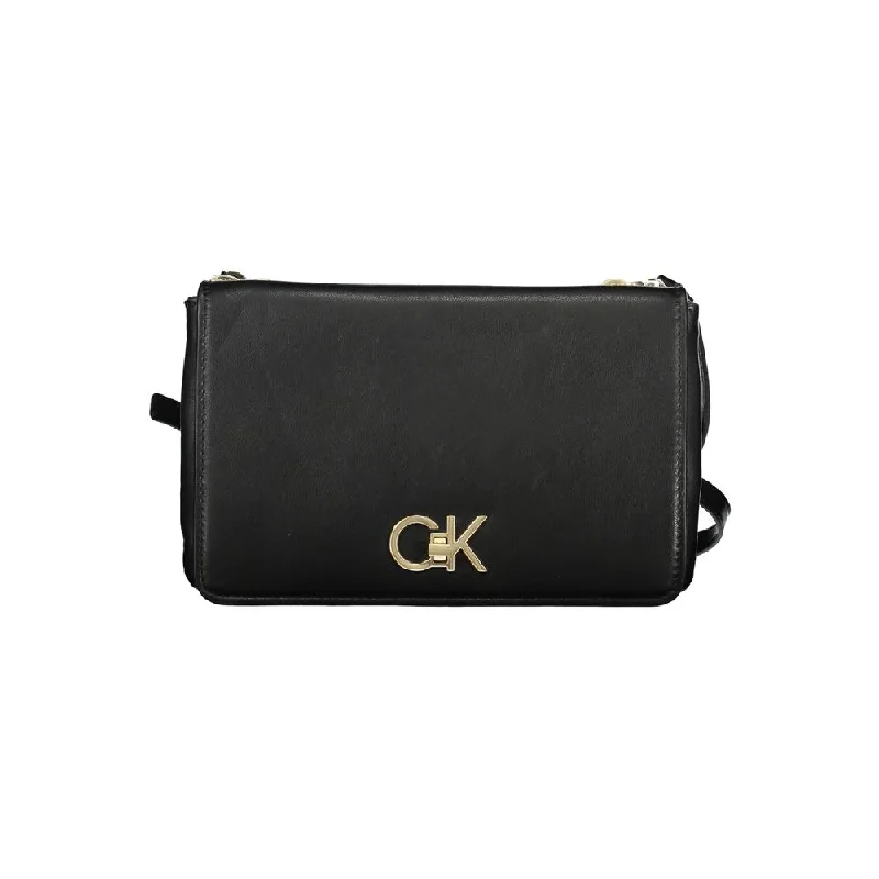 Calvin Klein bags with embossed logo designsCalvin Klein Black Polyester Handbag