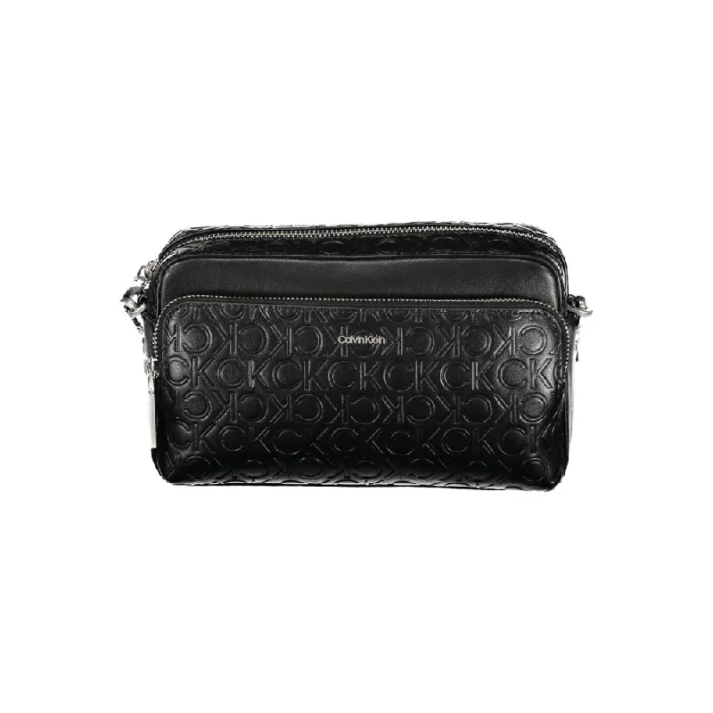 Calvin Klein bags with metallic and matte texturesCalvin Klein Black Polyester Handbag