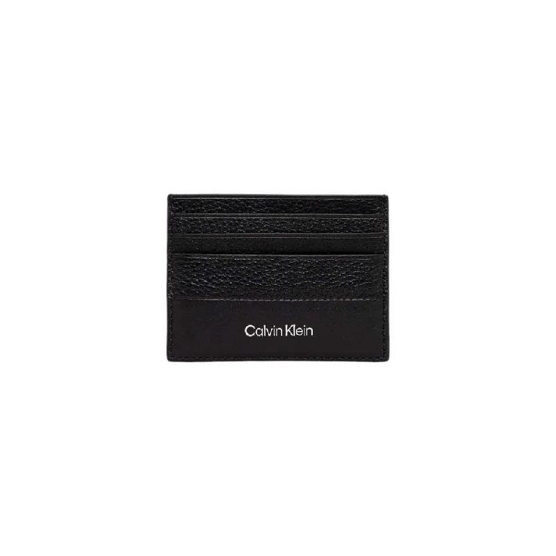 Calvin Klein bags with embossed logo designsCalvin Klein Black Leather Wallet