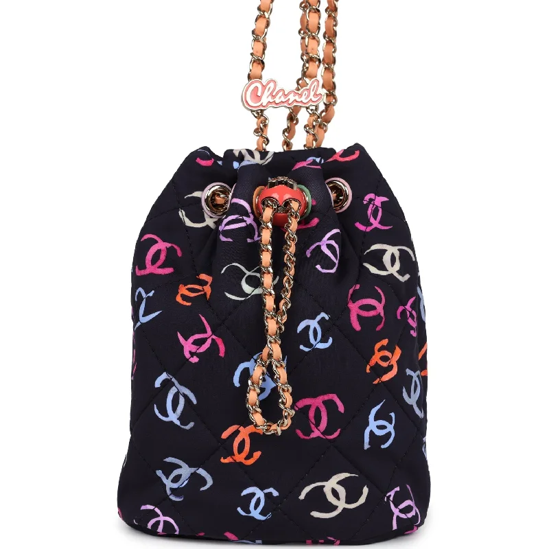 Chanel bags available in bold colors and patternsChanel Medium CC Drawstring Backpack Multicolored Printed Fabric Light Gold Hardware