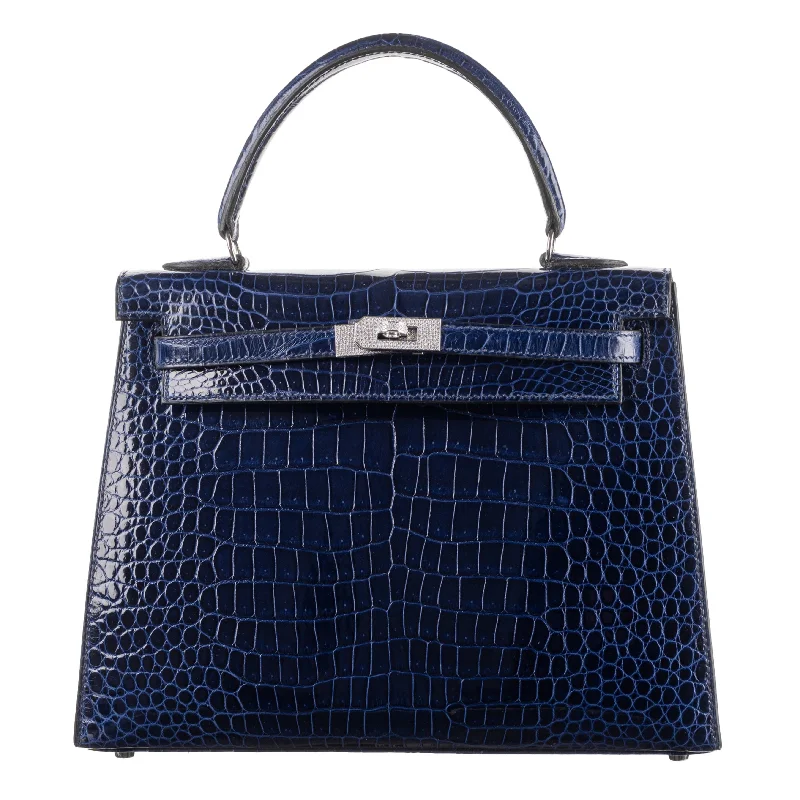 Hermès Kelly Bags in a neutral camel color for a versatile styleHermès 25cm Kelly Sellier Bleu Indigo Shiny Niloticus Crocodile Diamond Hardware