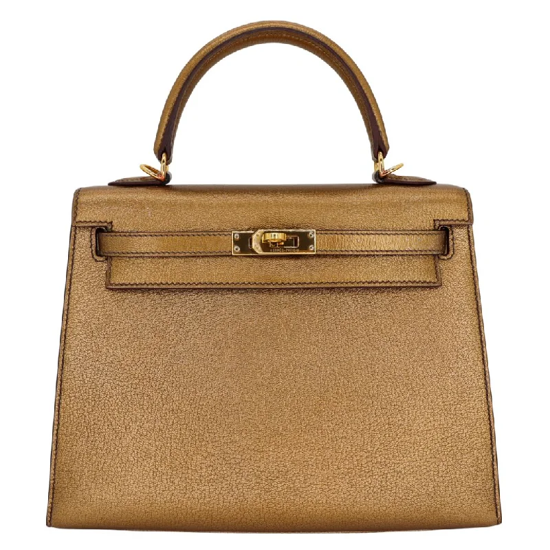 Hermès Kelly Bags with a flap - over closure and turnlock for a classic lookHermès 25cm Kelly Sellier Bronze Metallic Chevre Gold Hardware