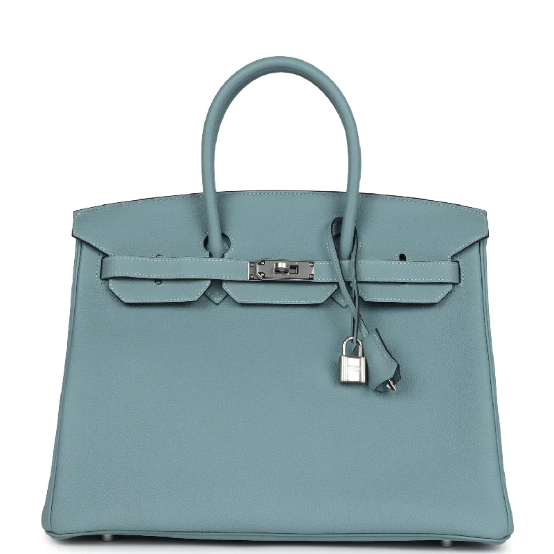 Hermès Kelly Bags in a vibrant electric blue for a pop of colorHermes Birkin Bags with a Detachable Mirror Pocket InsideHermes Birkin 35 Ciel Togo Palladium Hardware