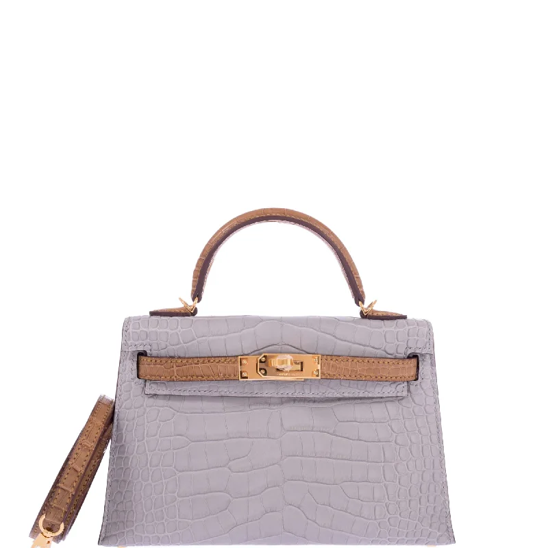 Hermès Kelly Bags with a key - lock and keychain setHermès Kelly 20 HSS Mini II Sellier Gris Perle and Kraft Matte Alligator Gold Hardware