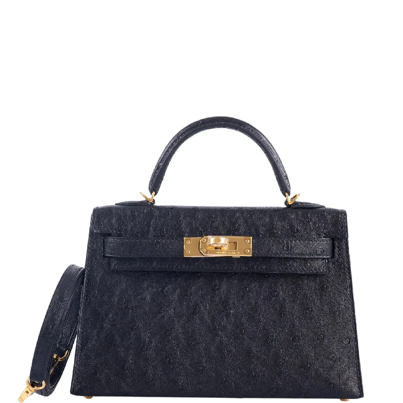 Hermès Kelly Bags with a decorative tassel charmHermès Kelly 20 Mini II Sellier Black Ostrich Gold Hardware