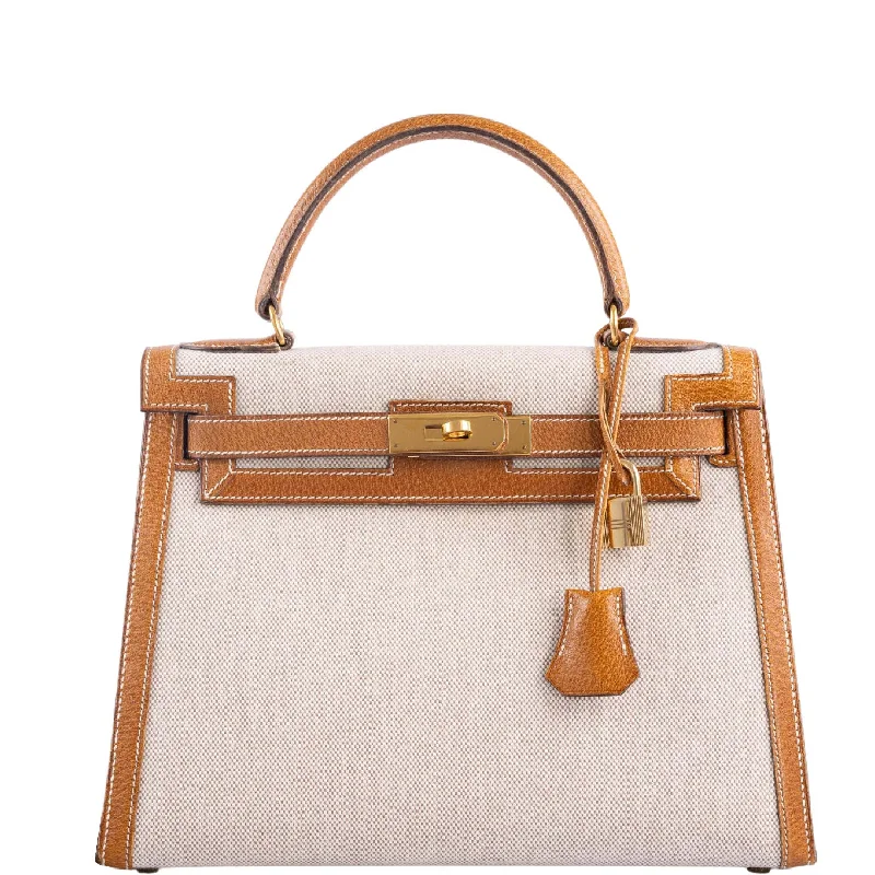 Hermès Kelly Bags with a quilted leather exterior for a luxurious feelVintage Hermès Kelly 28 Sellier Naturel & Écru Toile H and Peau Porc Gold Hardware