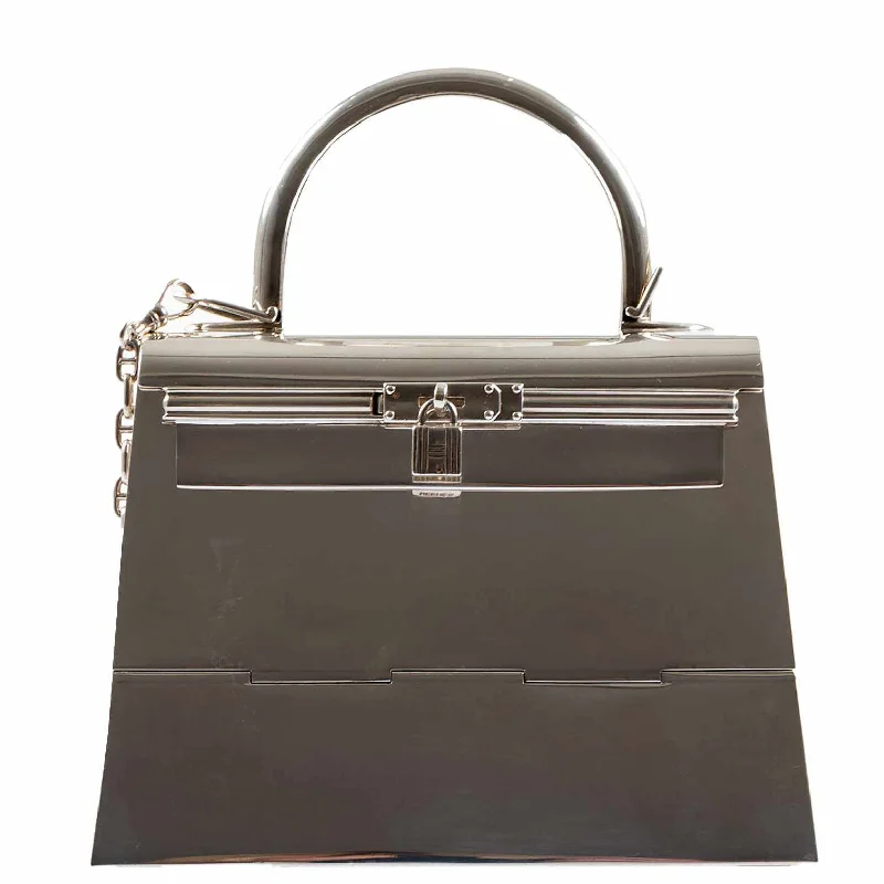 Hermès Kelly Bags with a snap - fastened front pocket for convenienceHermès Ultra-Rare Mini Kelly in Sterling Silver, 1990s