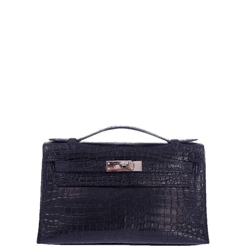 Hermès Kelly Bags with a flap - over closure and turnlock for a classic lookHermès Kelly Pochette Black Matte Nilo Crocodile Palladium Hardware