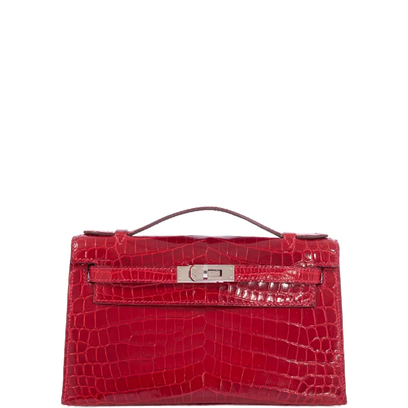 Hermès Kelly Bags with a braided leather handle for a bohemian touchHermès Kelly Pochette Braise Shiny Nilo Crocodile Palladium Hardware