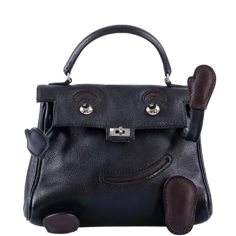 Hermès Kelly Bags with a single - handle design for simplicityHermès Kelly Doll Quelle Idole Black Gulliver Palladium Hardware