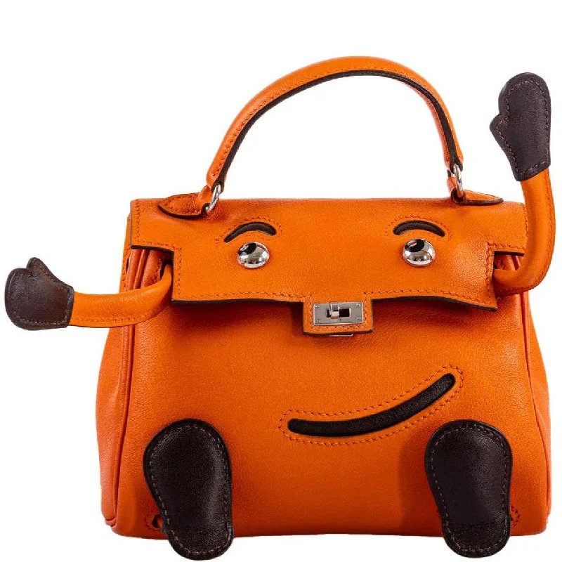 Hermès Kelly Bags in a vibrant electric blue for a pop of colorHermès Kelly Doll Quelle Idole Orange H Gulliver Palladium Hardware