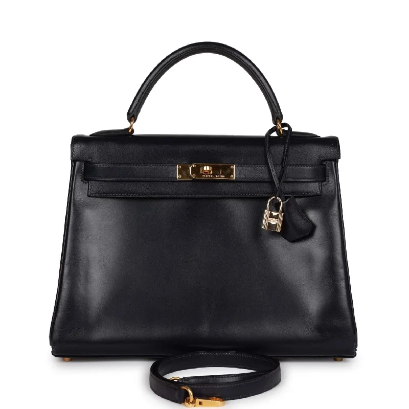 Hermès Kelly Bags with a magnetic - snap closure for easy accessVintage Hermes Kelly Retourne 32 Navy Box Gold Hardware