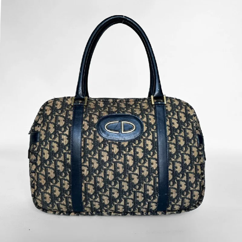 Christian Dior tote bags with a printed Dior logo on the frontDior Vintage Bowling Bag Oblique Canvas